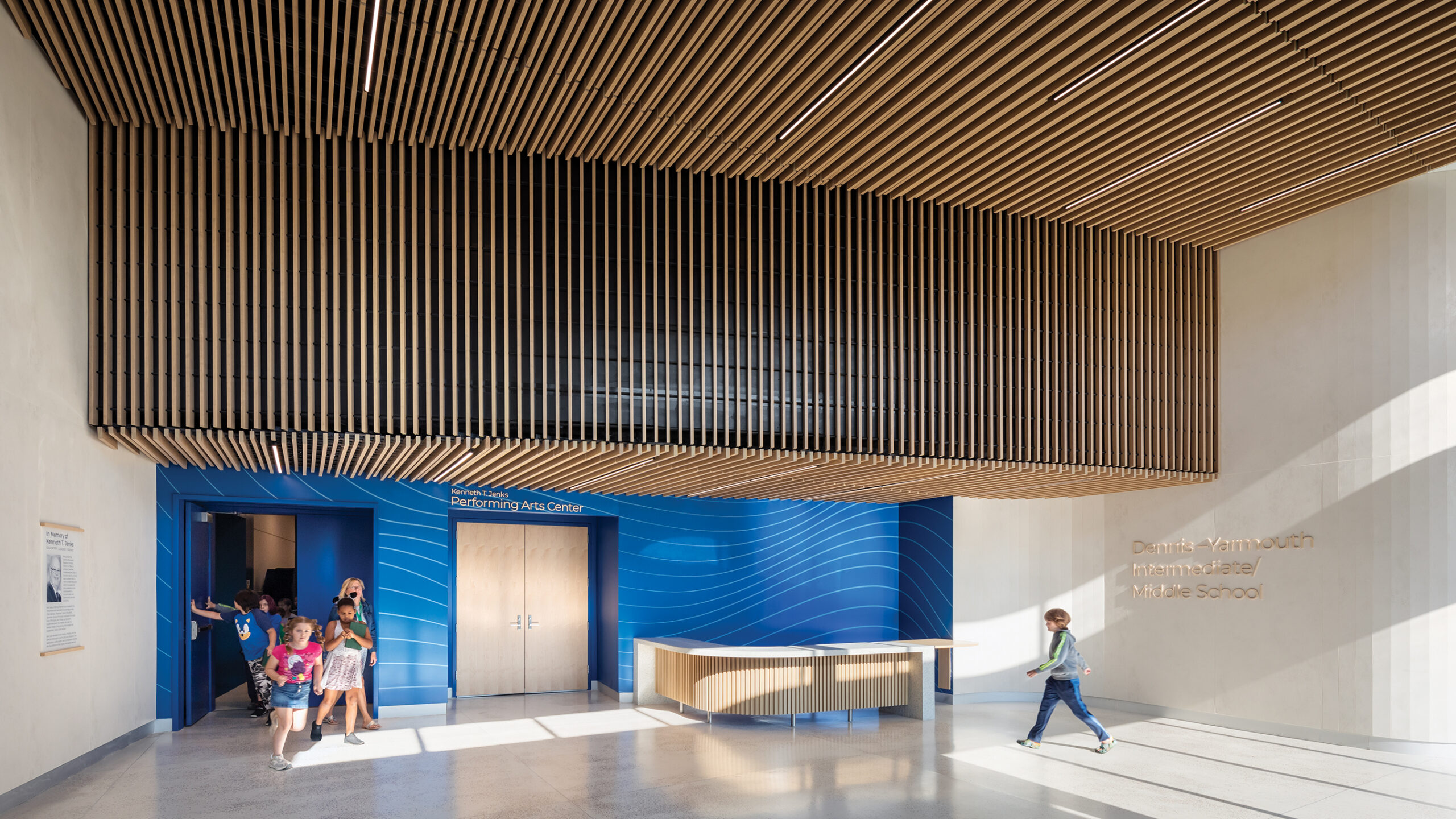 Dennis Yarmouth MS_Photo Int Auditorium Lobby 2_Photograph by Andrew Rugge - Copyright Perkins Eastman