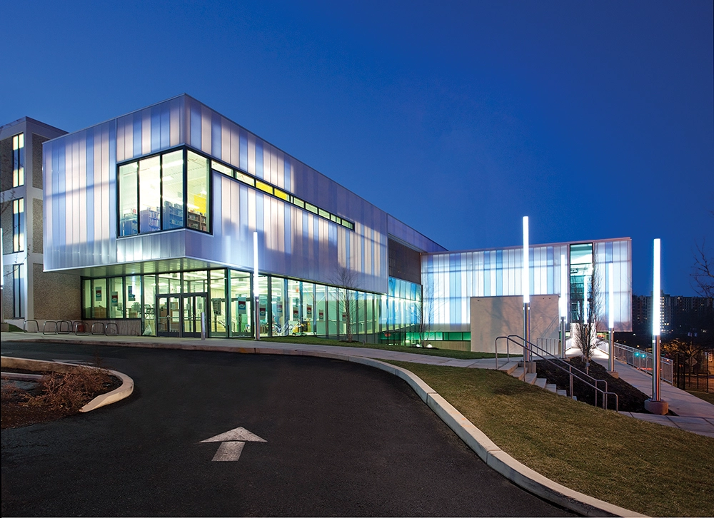 At night, Eagle Academy’s façade emits a soft glow, enhancing visibility in the community. Photo: Kingspan Light + Air