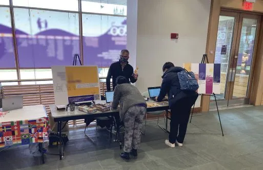 A Living Process of Engagement: An inviting engagement table set up that provides a visible and approachable platform for ongoing dialogue, identity, and shared ownership. Photo: Arjun Mande