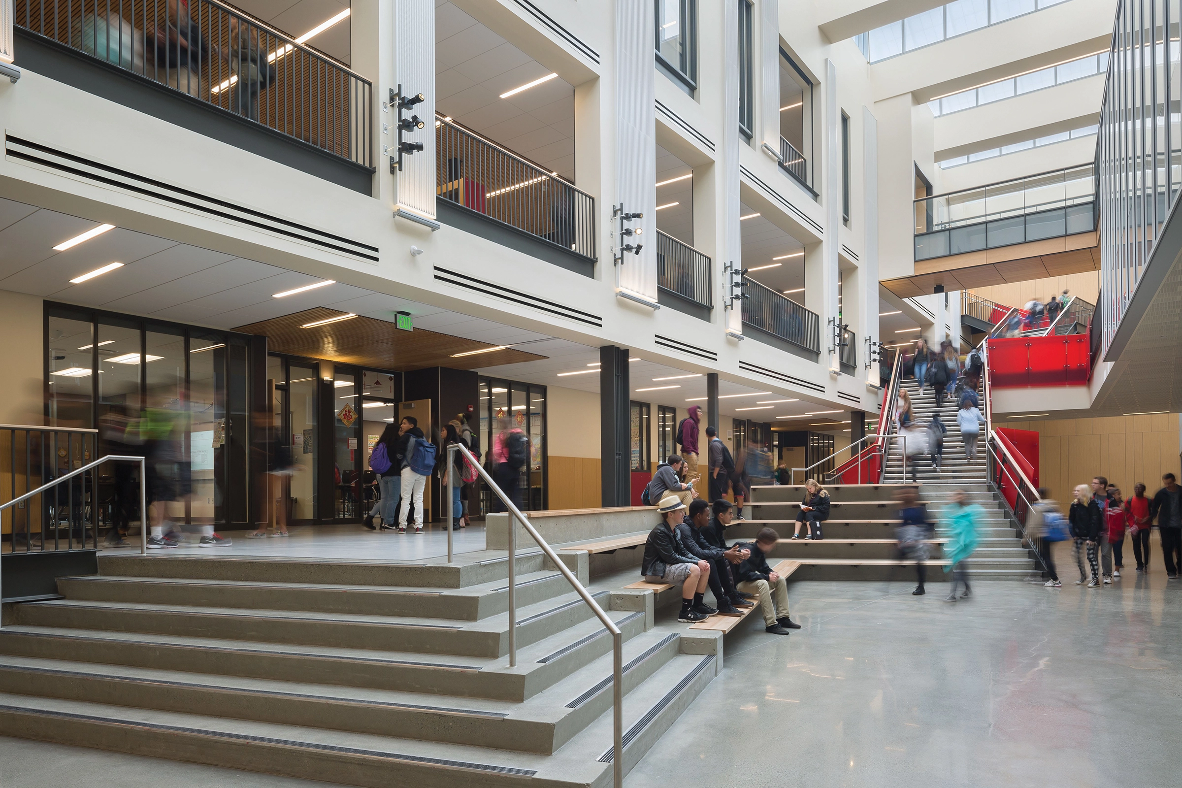 The central atrium space at Sammamish High School in Bellevue, WA supports a variety of scales and types of student socialization activities. Photo: Lara Swimmer