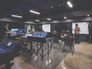 Audio engineering classroom designed for hands‑on training with professional‑grade mixing consoles. Photo: Jeremiah Hull