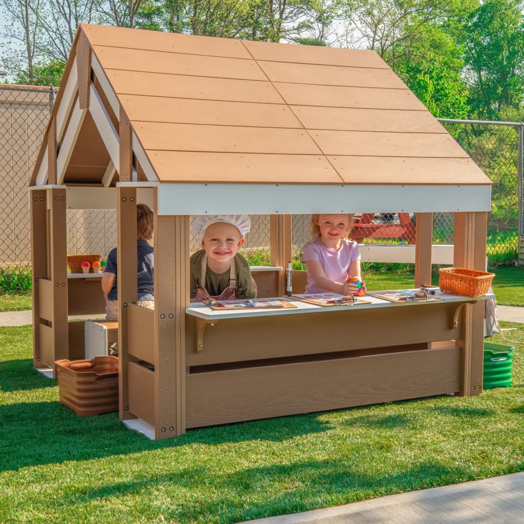 outdoorED™ Learning Pavilion A sheltered, freestanding outdoor activity center for small group learning, hands-on projects and imaginative play that will keep young learners engaged for hours. Whitney Brothers® Booth #1513 whitneybros.com